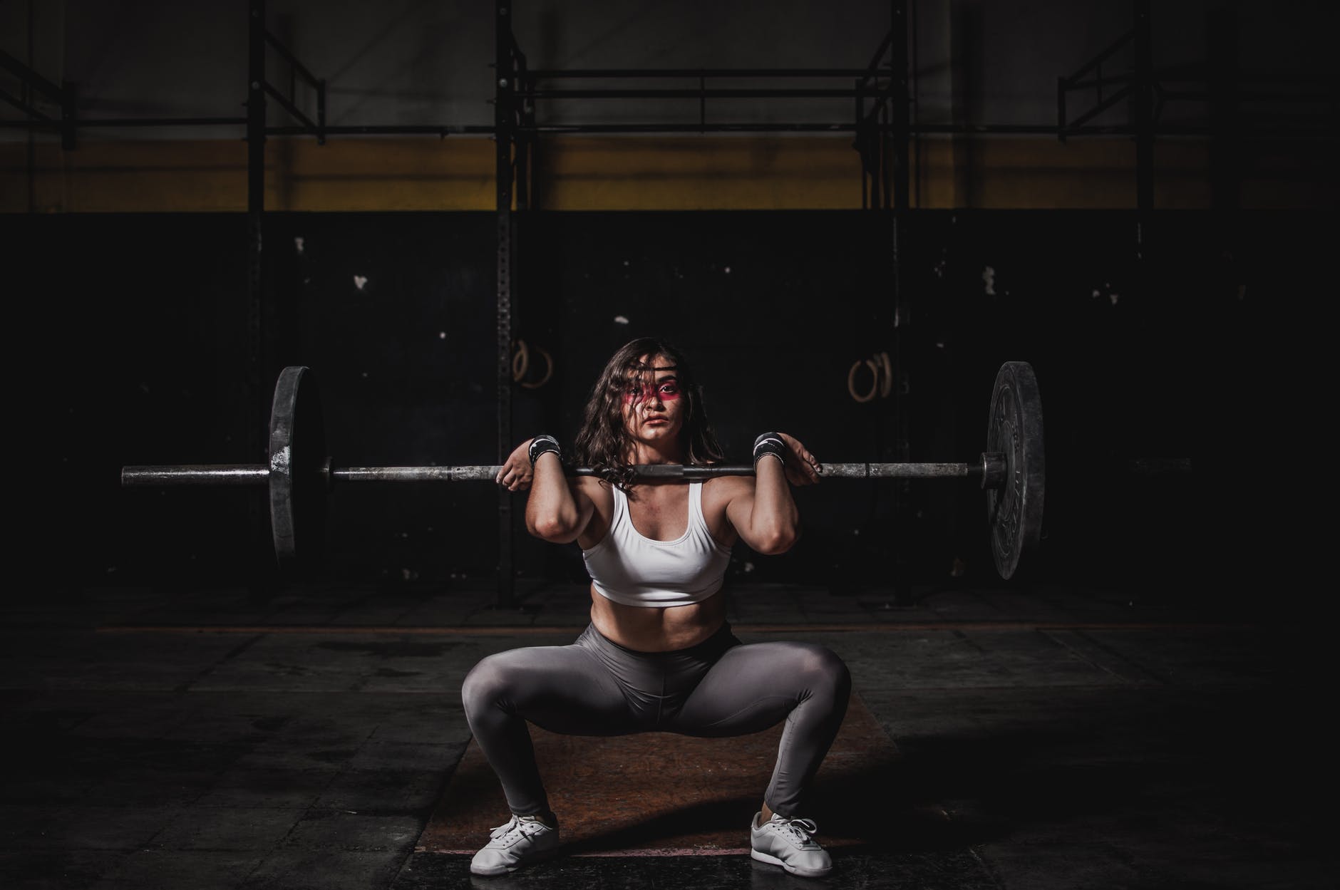 woman lifting barbell, Women Of Color in the Fitness Industry
